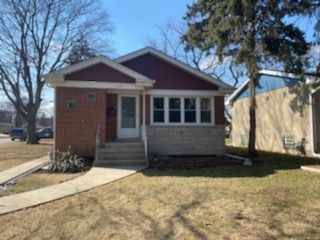 526 High Ridge Road Hillside, IL 60162 - Photo 1 of 19 a front view of a house with a yard