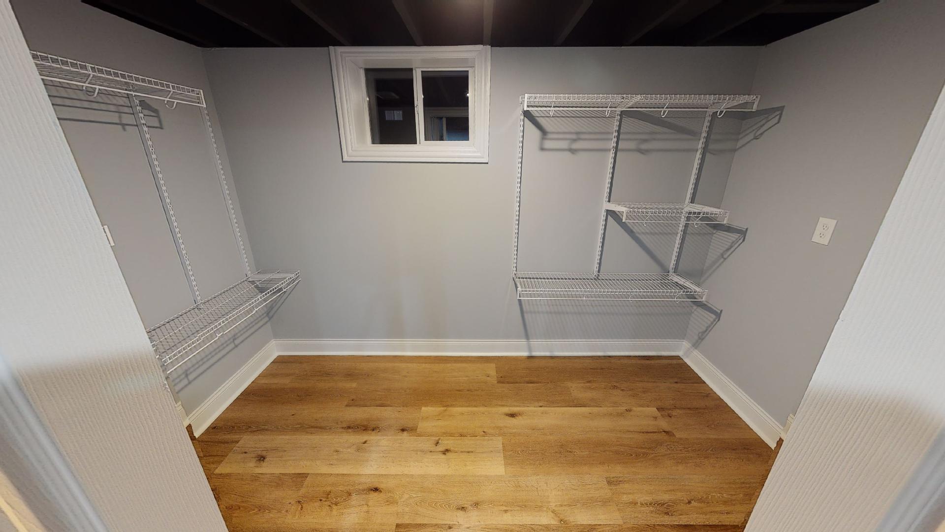526 High Ridge Road Hillside, IL 60162 - Photo 9 of 19 a view of an empty room with wooden floor and cabinet