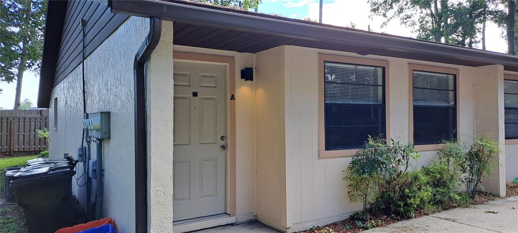 1715 Southwest 69 Way, Unit A Gainesville, FL 32607 - Photo 2 of 18 a view of front door of house