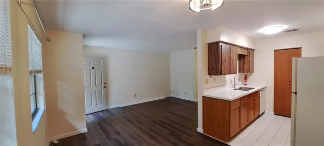 a bathroom with a sink a mirror and shower