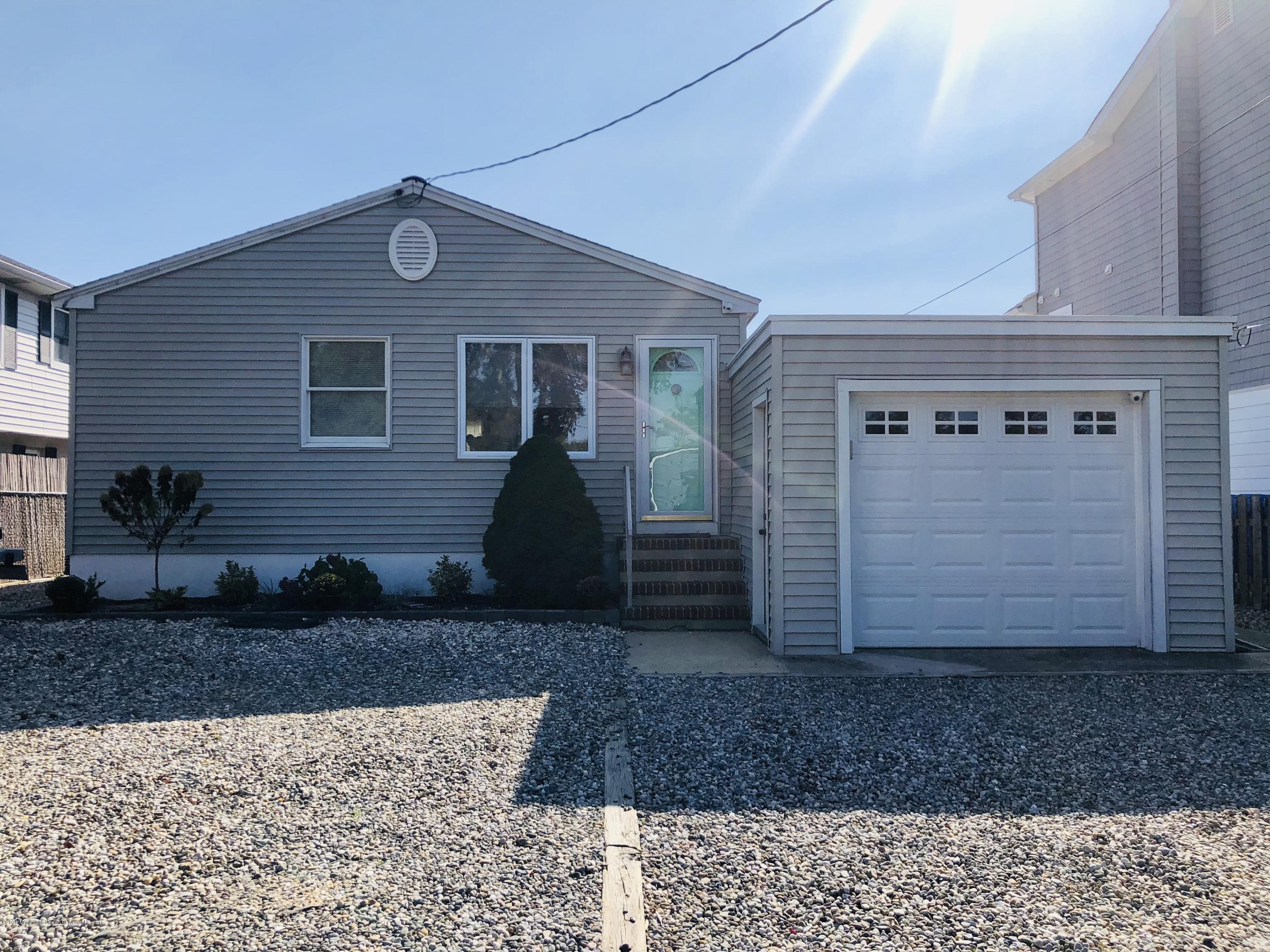 29 Mandalay Road Brick, NJ 08723 - Photo 3 of 13 a view of a house with a yard