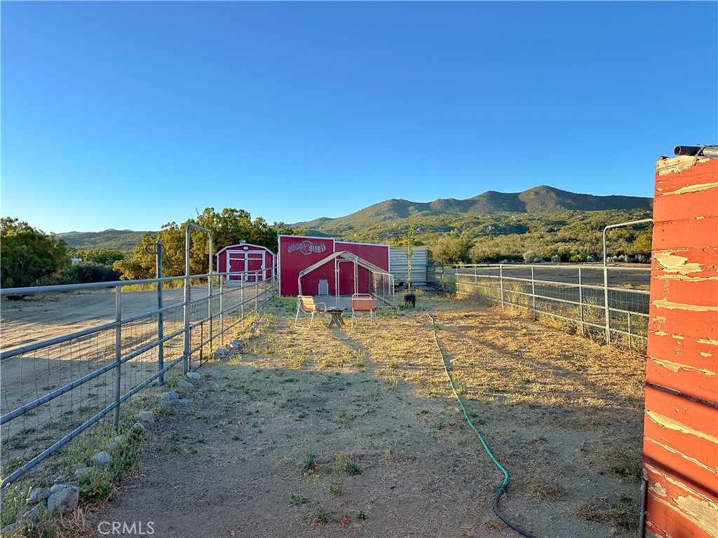 29820 Chihuahua Valley Road Warner Springs, CA 92086 - Photo 39 of 75 a view of a lake with a houses in the background