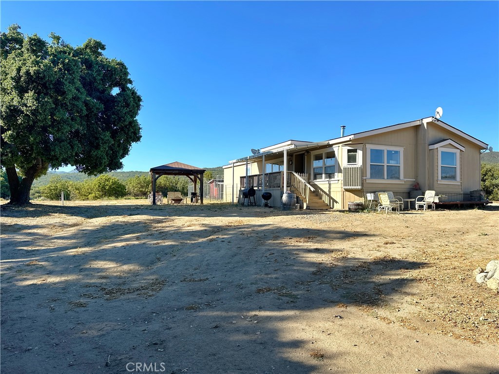 29820 Chihuahua Valley Road Warner Springs, CA 92086 - Photo 50 of 75 a front view of a house with a yard