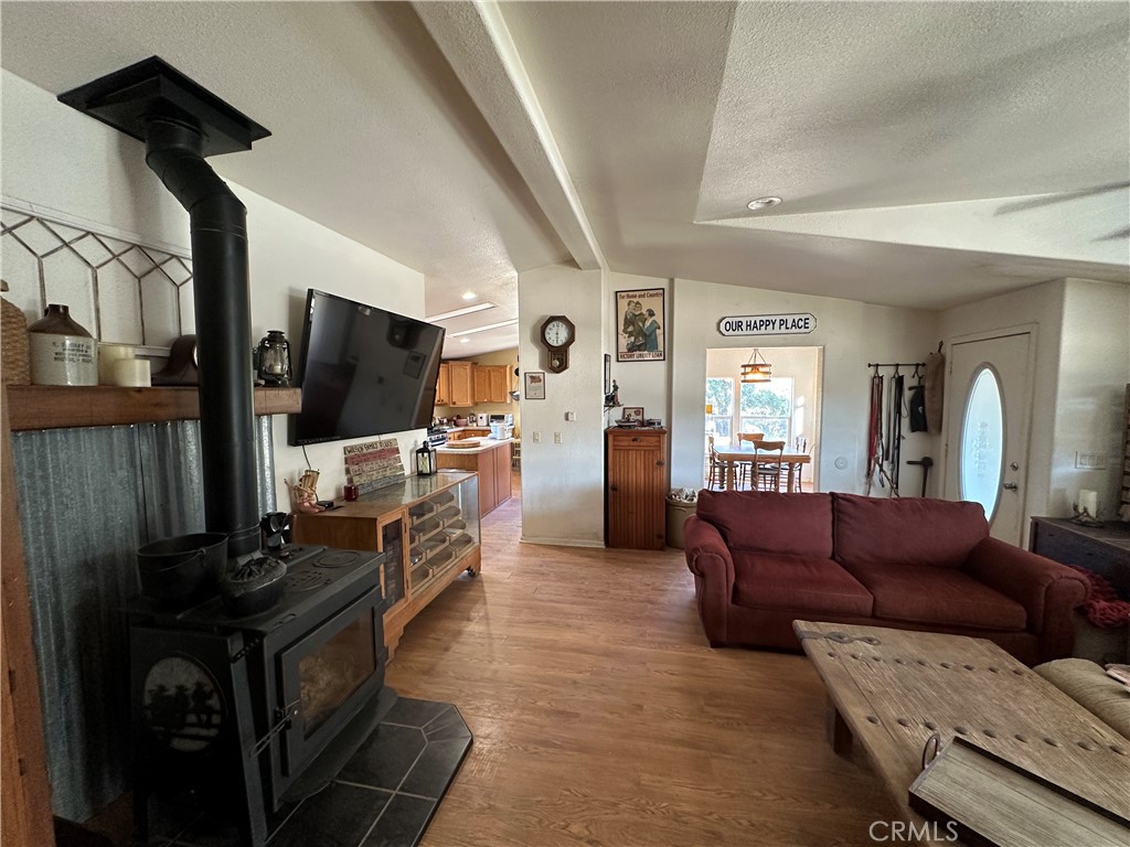 29820 Chihuahua Valley Road Warner Springs, CA 92086 - Photo 56 of 75 a living room with furniture and a flat screen tv
