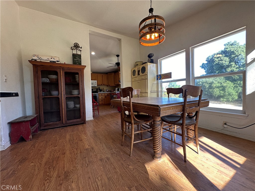 29820 Chihuahua Valley Road Warner Springs, CA 92086 - Photo 57 of 75 a view of a dining room with furniture window and wooden floor