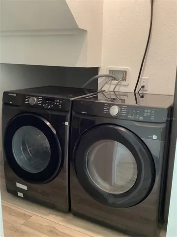 a utility room with dryer and washer