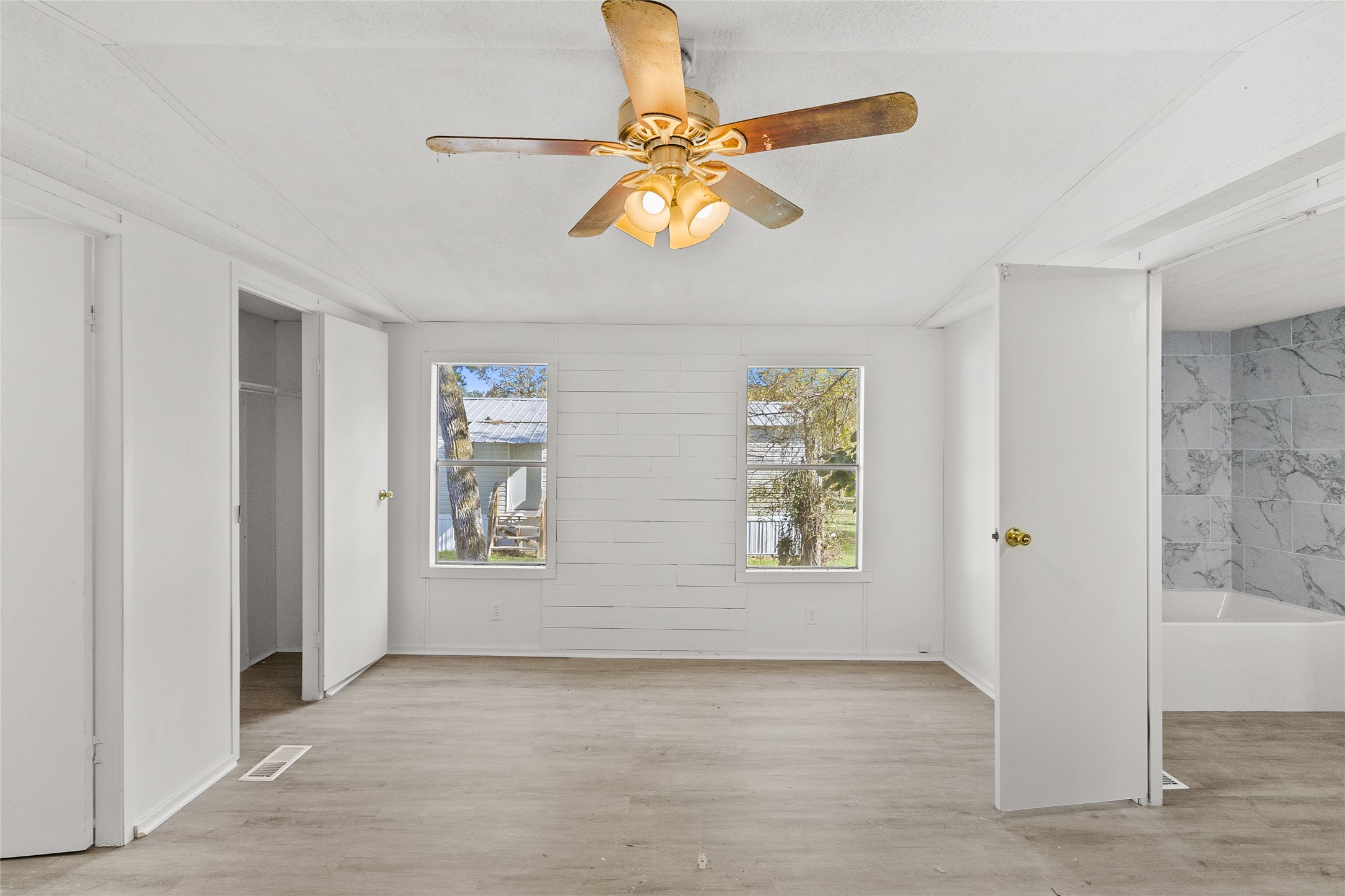 1202 Highway 190, Unit 16 Huntsville, TX 77340 - Photo 13 of 23 a view of an empty room with window
