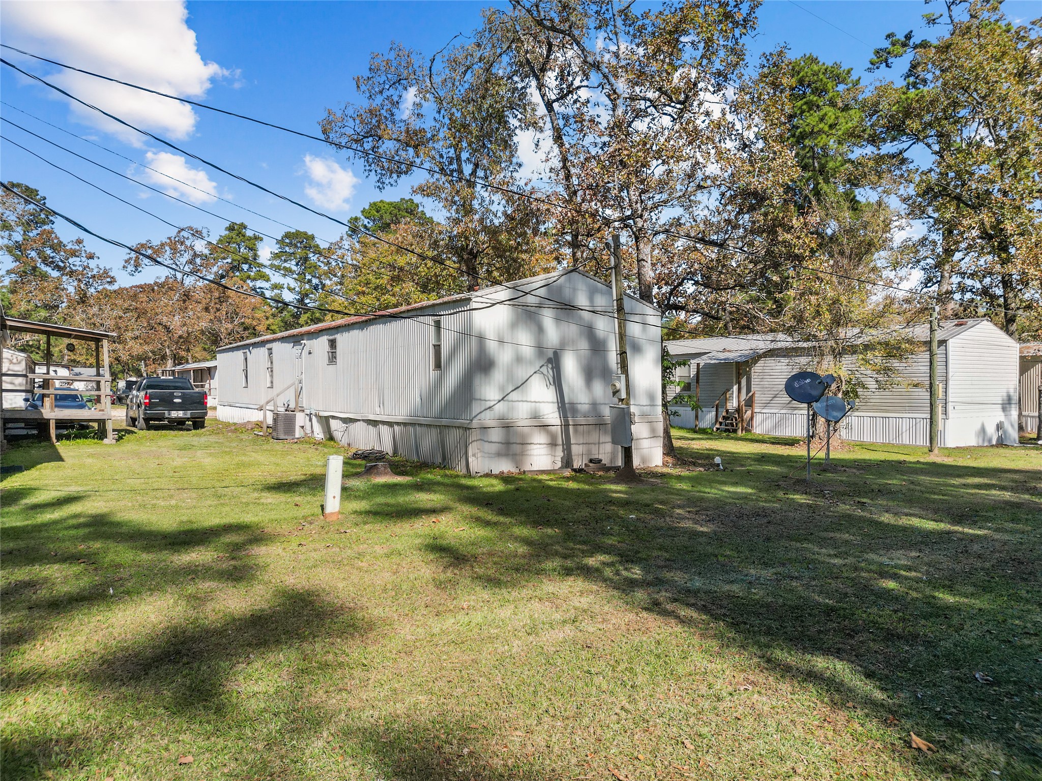 1202 Highway 190, Unit 16 Huntsville, TX 77340 - Photo 21 of 23 a view of a park with slide