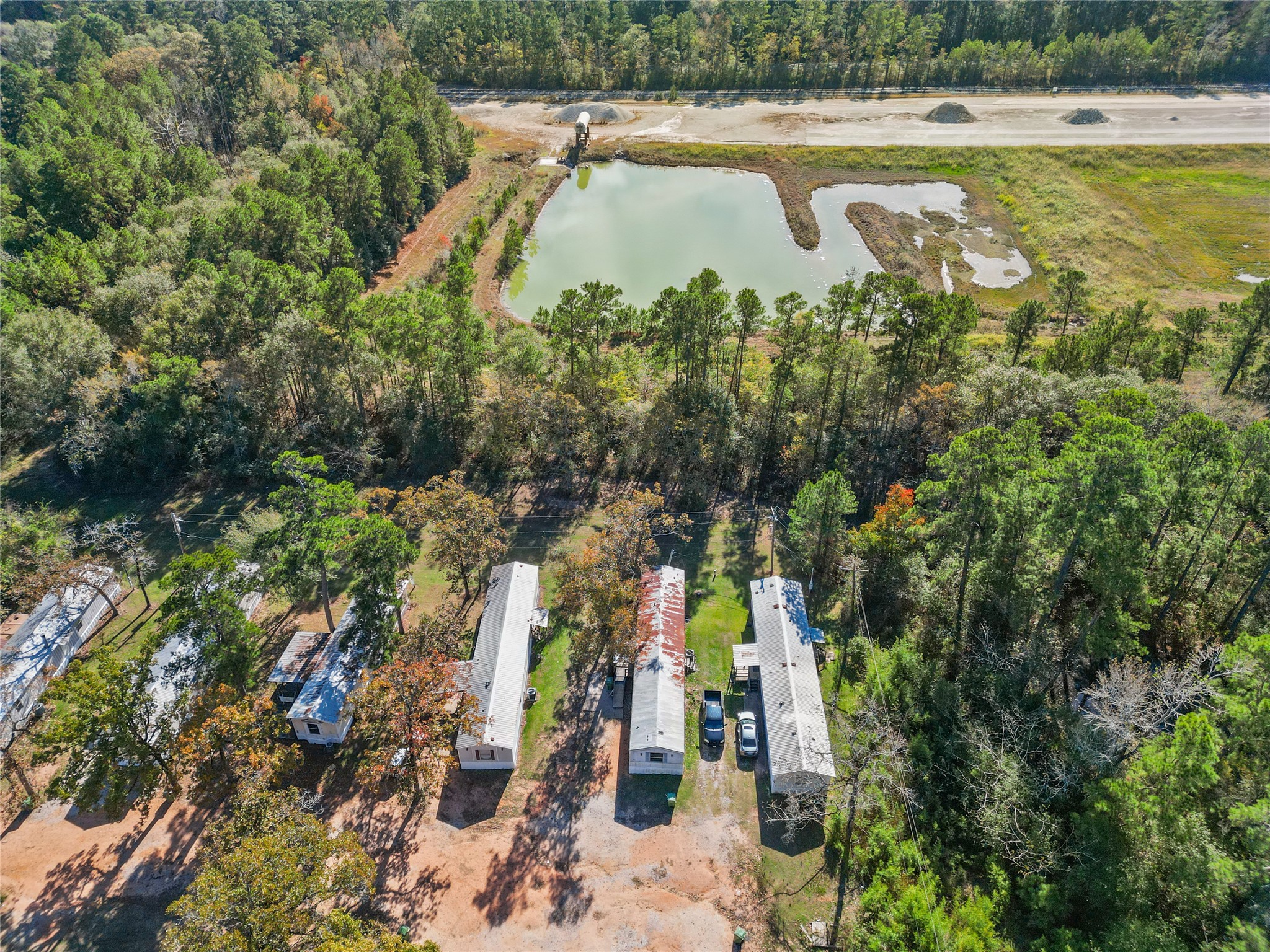 1202 Highway 190, Unit 16 Huntsville, TX 77340 - Photo 23 of 23 a view of a lake with a park