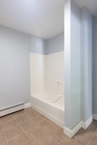 a room with a sink and a window