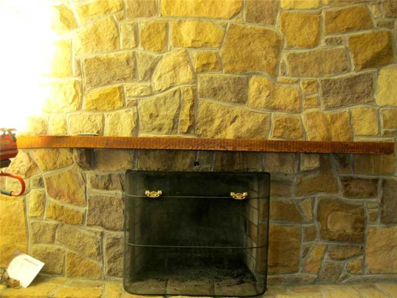 505 Dick Road Butler, PA 16001 - Photo 5 of 21 Family Room. One of two stone fireplaces, this one is in the main floor family room open to the kitchen.