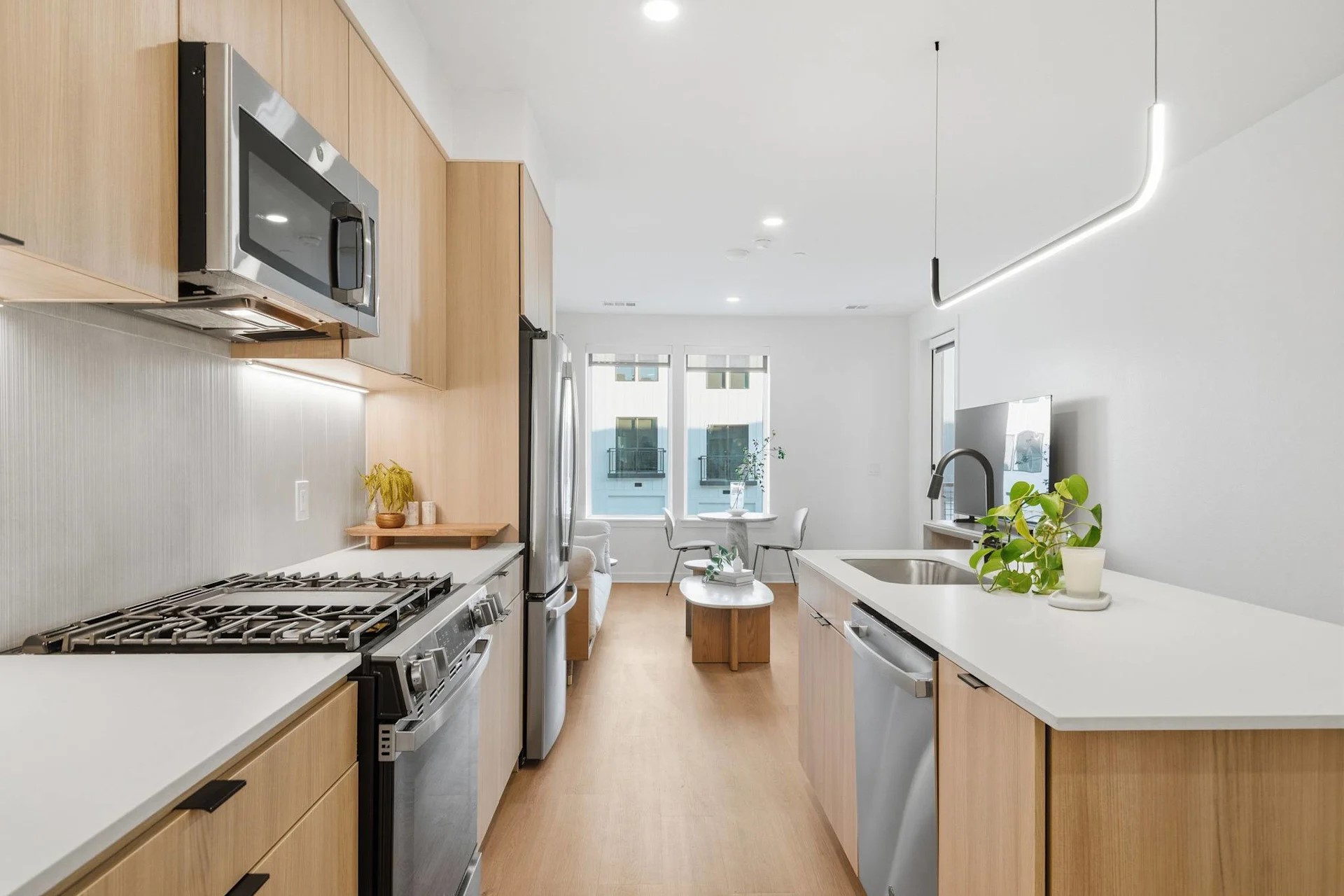1941 Sawdust Road, Unit 4111 Spring, TX 77380 - Photo 22 of 24 a kitchen with stove a sink and refrigerator