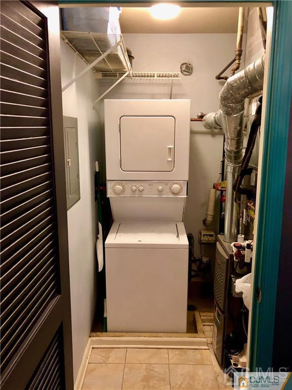 910 Meadow Court, Unit 910 Helmetta, NJ 08828 - Photo 39 of 43 a utility room with dryer and washer