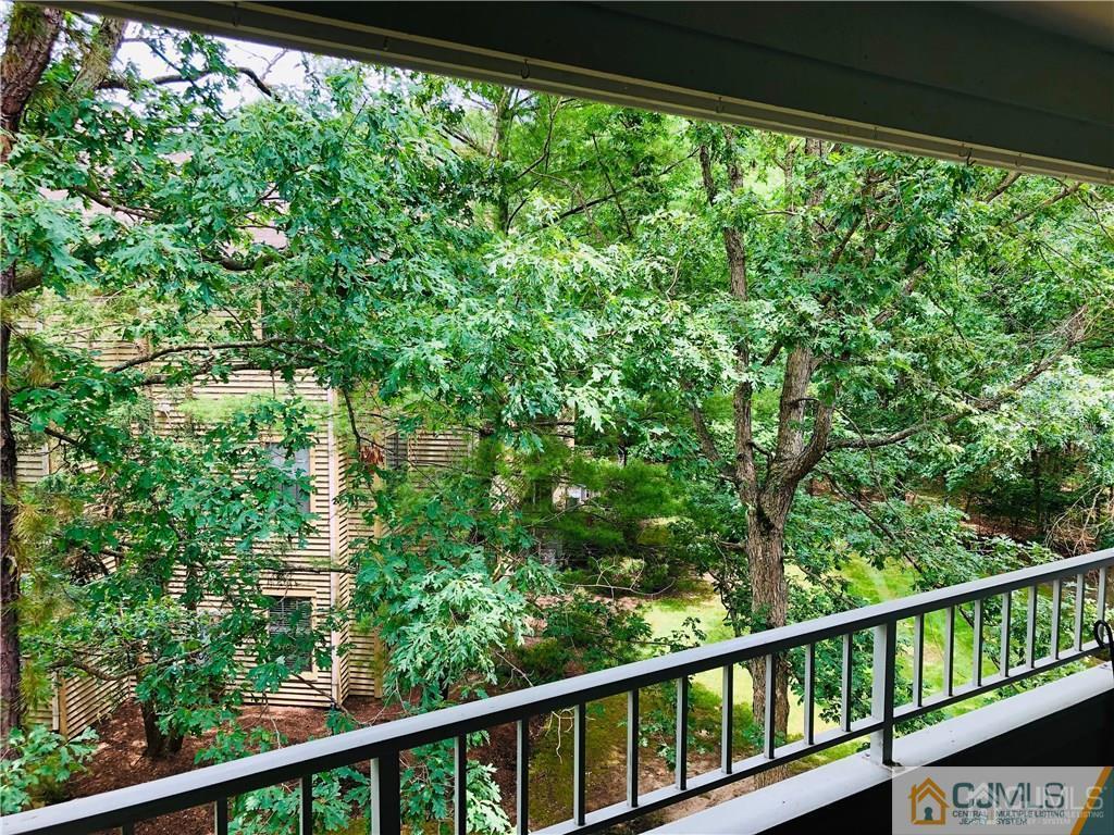 910 Meadow Court, Unit 910 Helmetta, NJ 08828 - Photo 5 of 43 a view of a balcony with an outdoor space