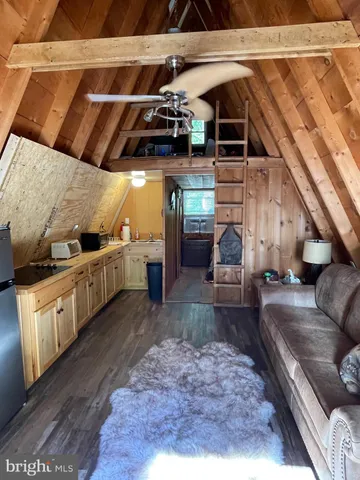 a view of a living room with a rug