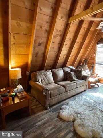 a living room with furniture and a couch