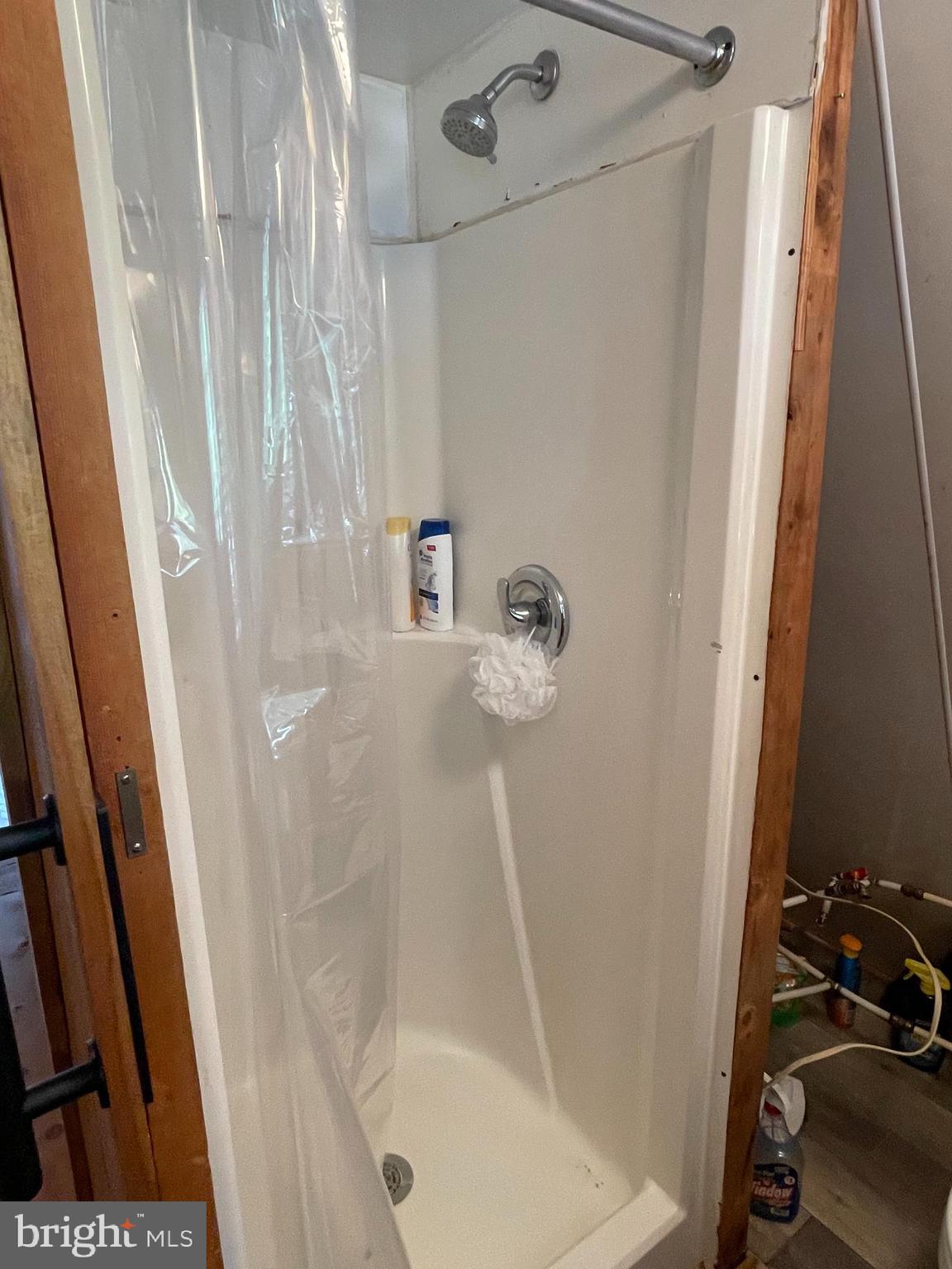 198 Black Gap Road, Unit 56 Fayetteville, PA 17222 - Photo 23 of 30 a bathroom with a shower