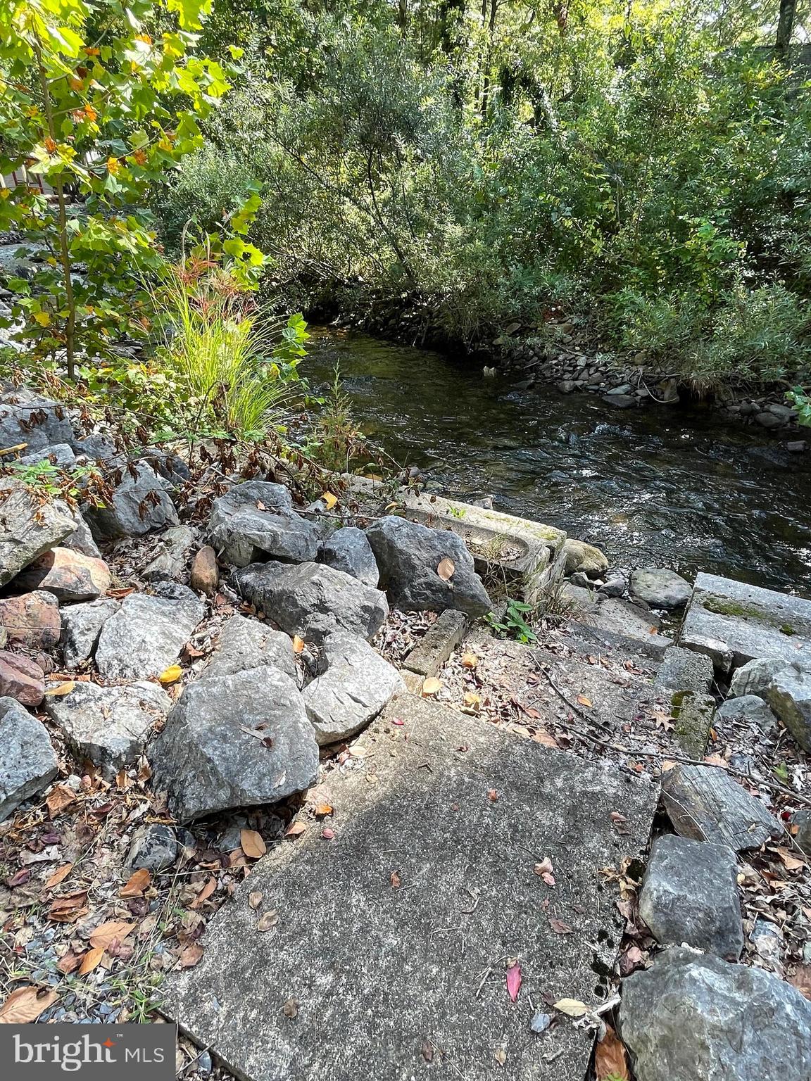 198 Black Gap Road, Unit 56 Fayetteville, PA 17222 - Photo 28 of 30 a view of a lake with lots of trees