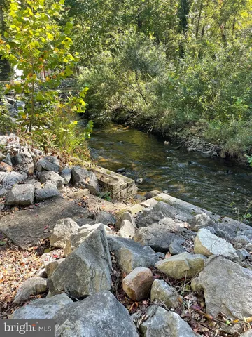 a view of a lake with an outdoor space