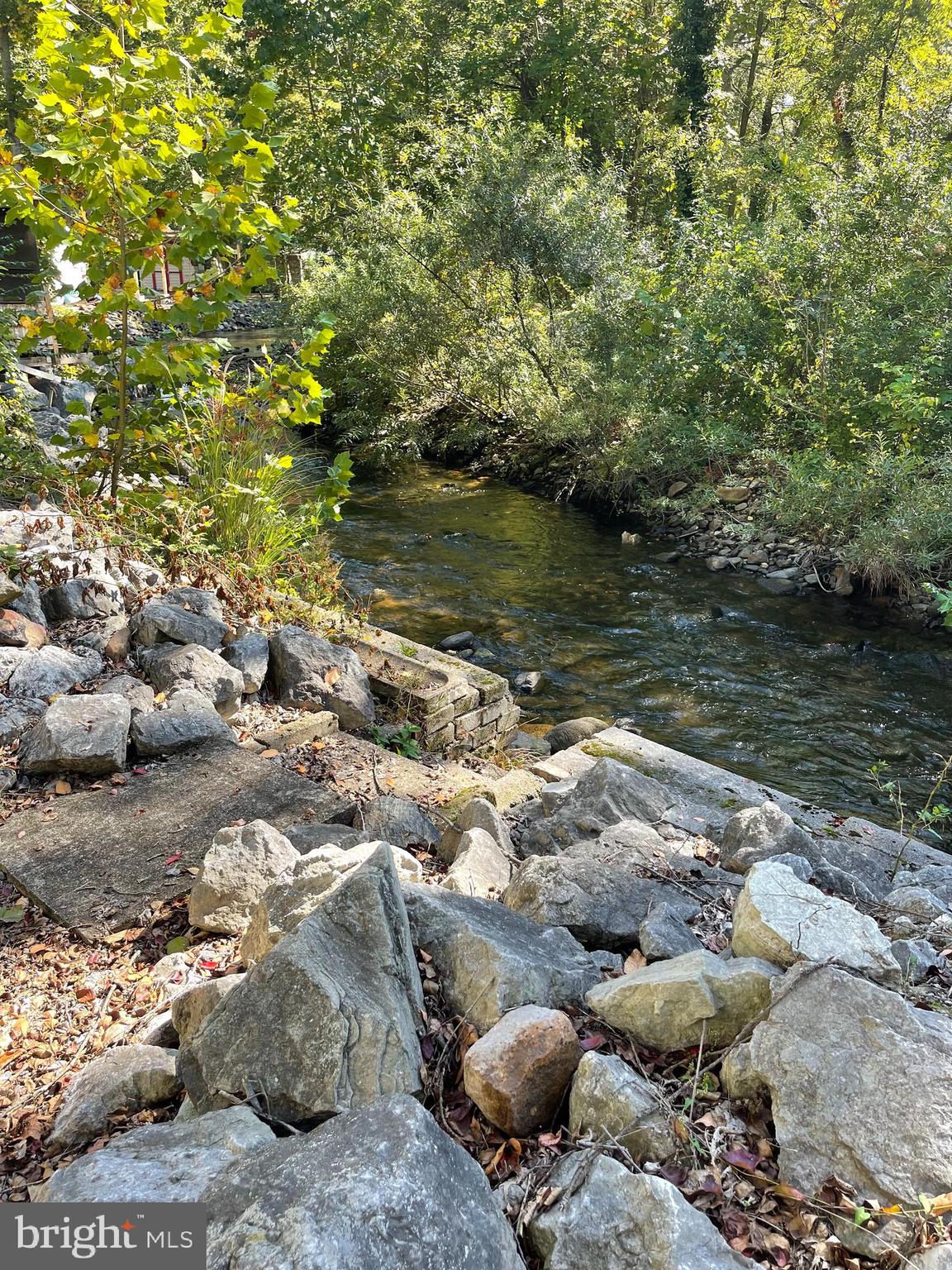 198 Black Gap Road, Unit 56 Fayetteville, PA 17222 - Photo 5 of 30 a view of a lake with an outdoor space