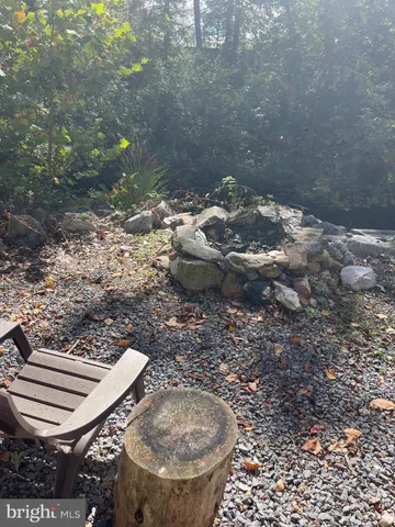 a view of a backyard of the house