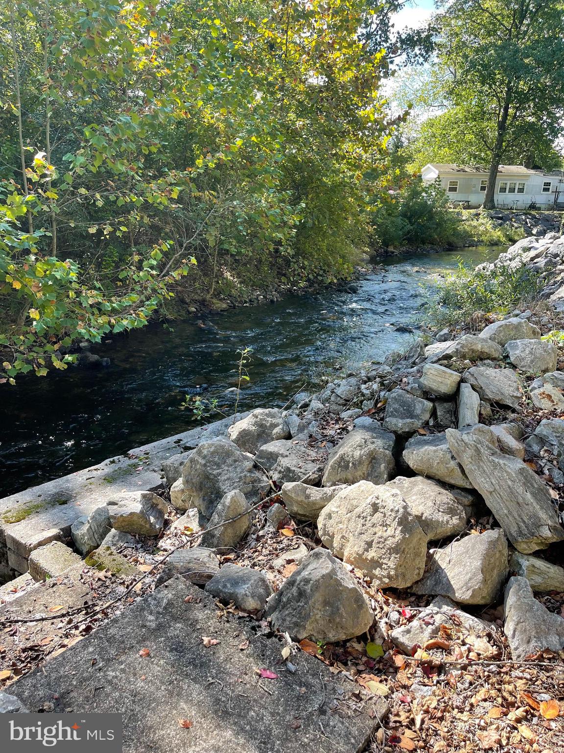 198 Black Gap Road, Unit 56 Fayetteville, PA 17222 - Photo 8 of 30 a view of a road with trees in the background