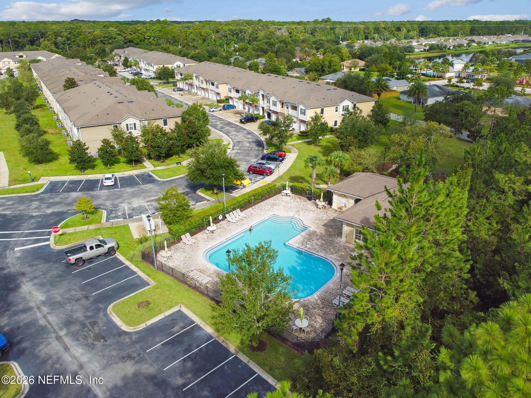 2113 Golden Lake Loop St. Augustine, FL 32084 - Photo 45 of 50 an aerial view of a swimming pool playground and residential houses with outdoor space