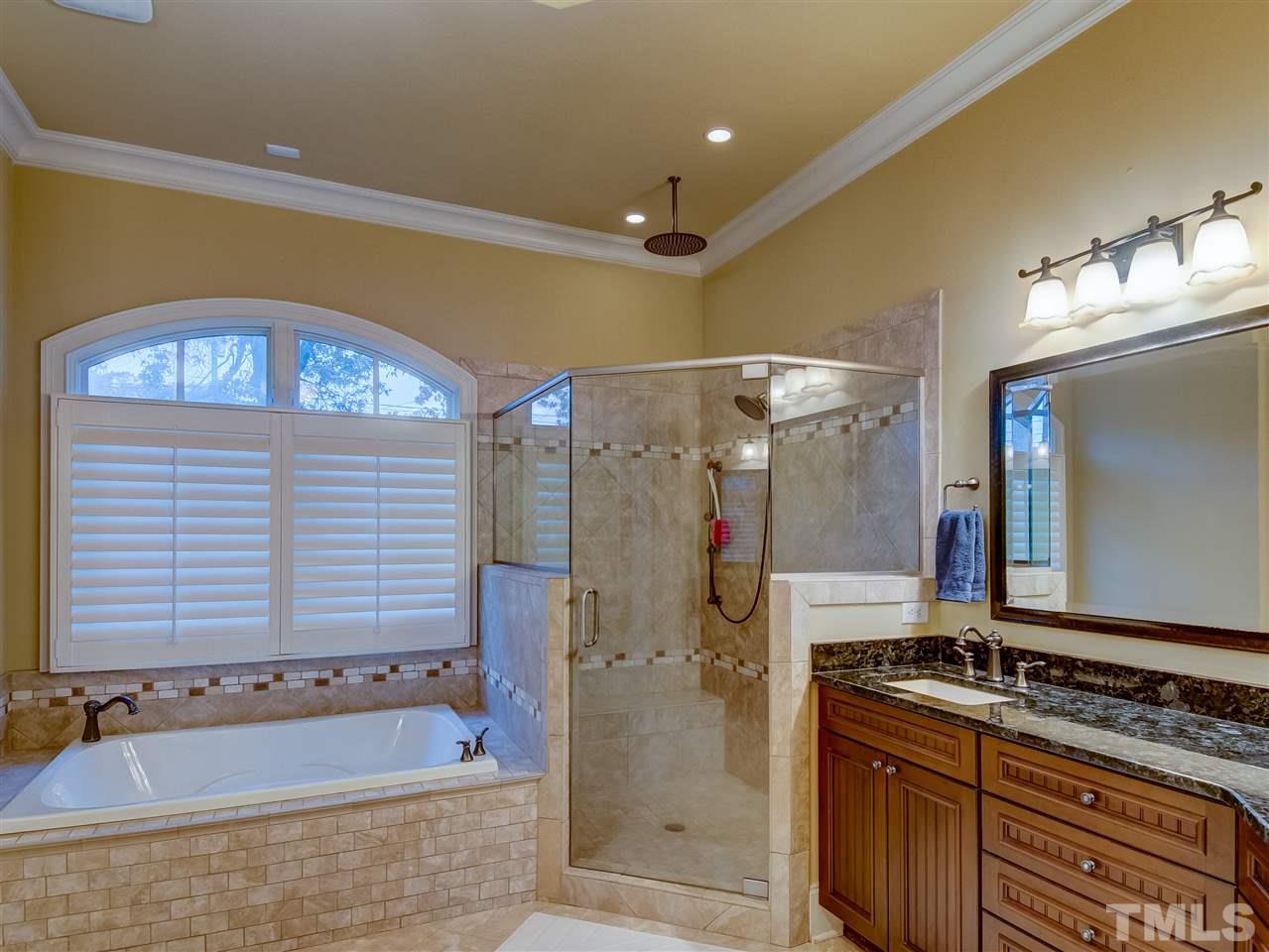 1908 Ridge Road Raleigh, NC 27607 - Photo 15 of 30 a bathroom with a granite countertop double vanity sink mirror and shower