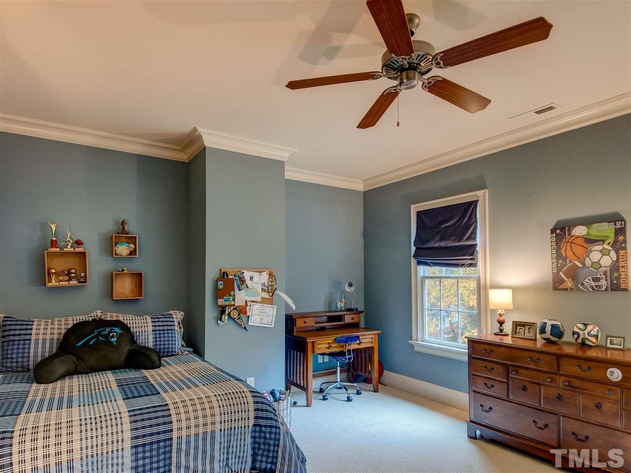 1908 Ridge Road Raleigh, NC 27607 - Photo 17 of 30 a bedroom with a bed and a window