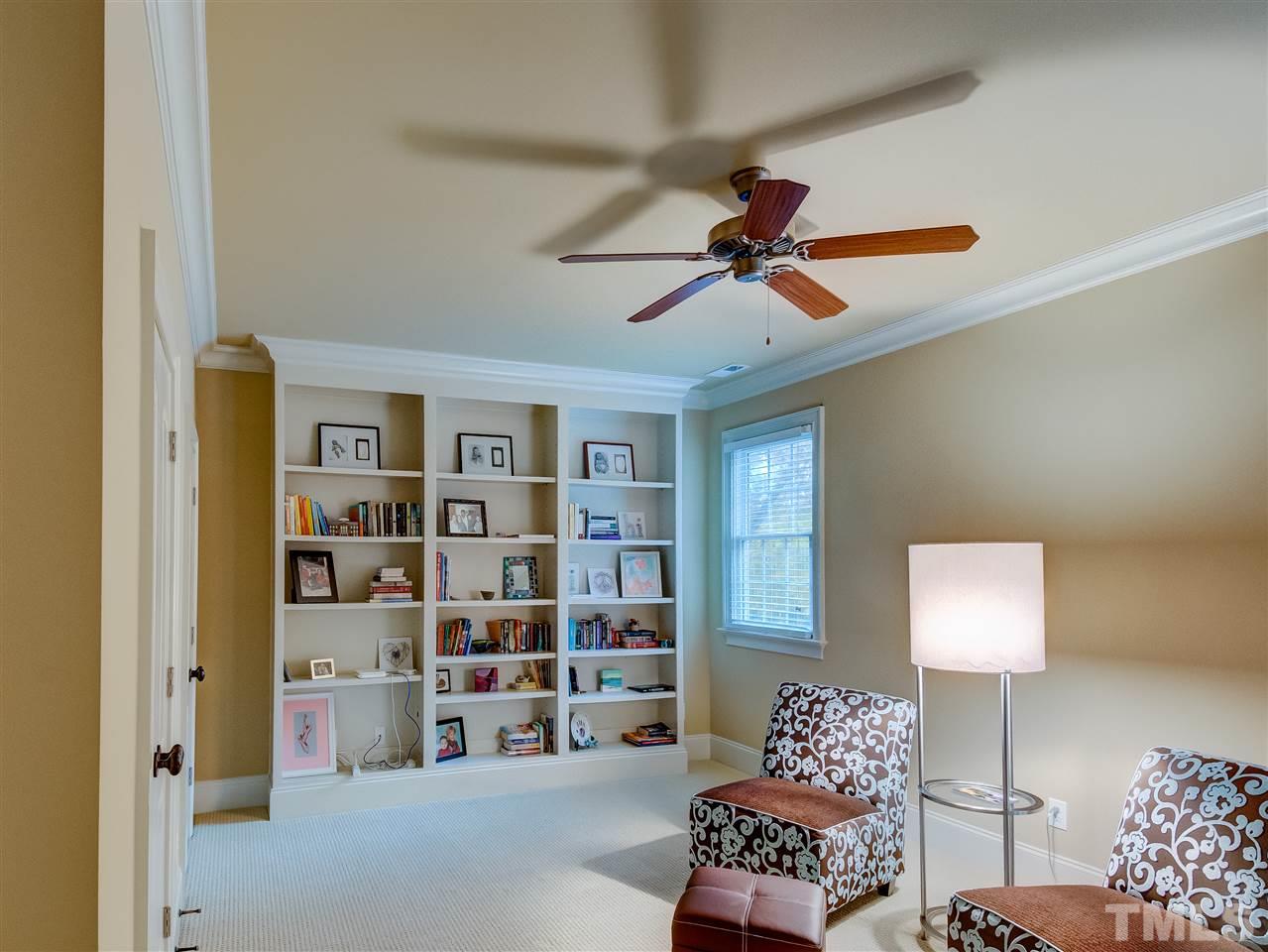 1908 Ridge Road Raleigh, NC 27607 - Photo 18 of 30 a living room with furniture cabinets and a window