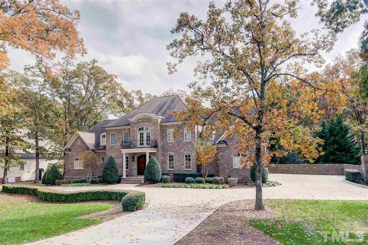 1908 Ridge Road Raleigh, NC 27607 - Photo 28 of 30 a front view of a house with a yard and tree s