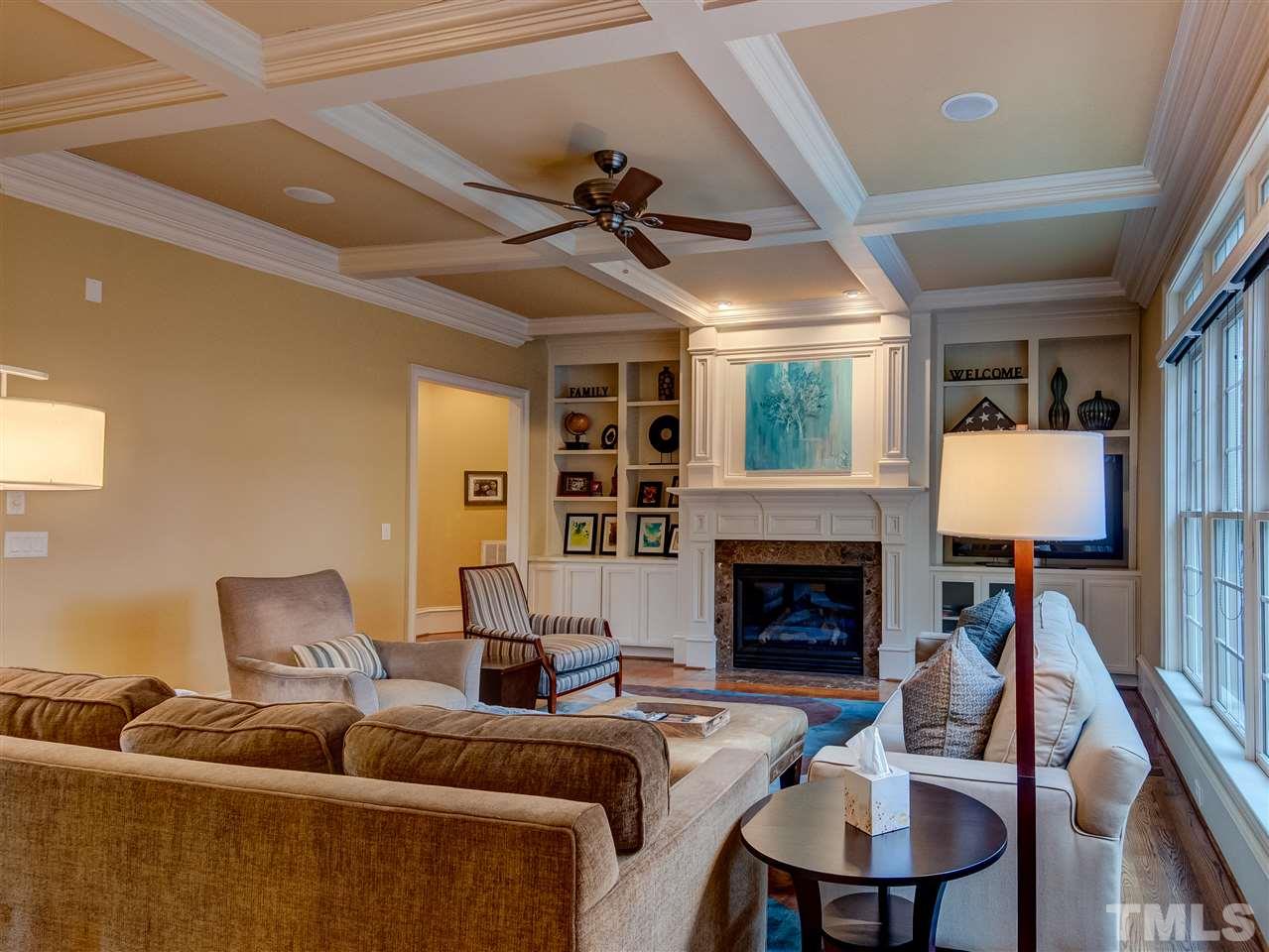 1908 Ridge Road Raleigh, NC 27607 - Photo 10 of 30 a living room with furniture a fireplace and a flat screen tv