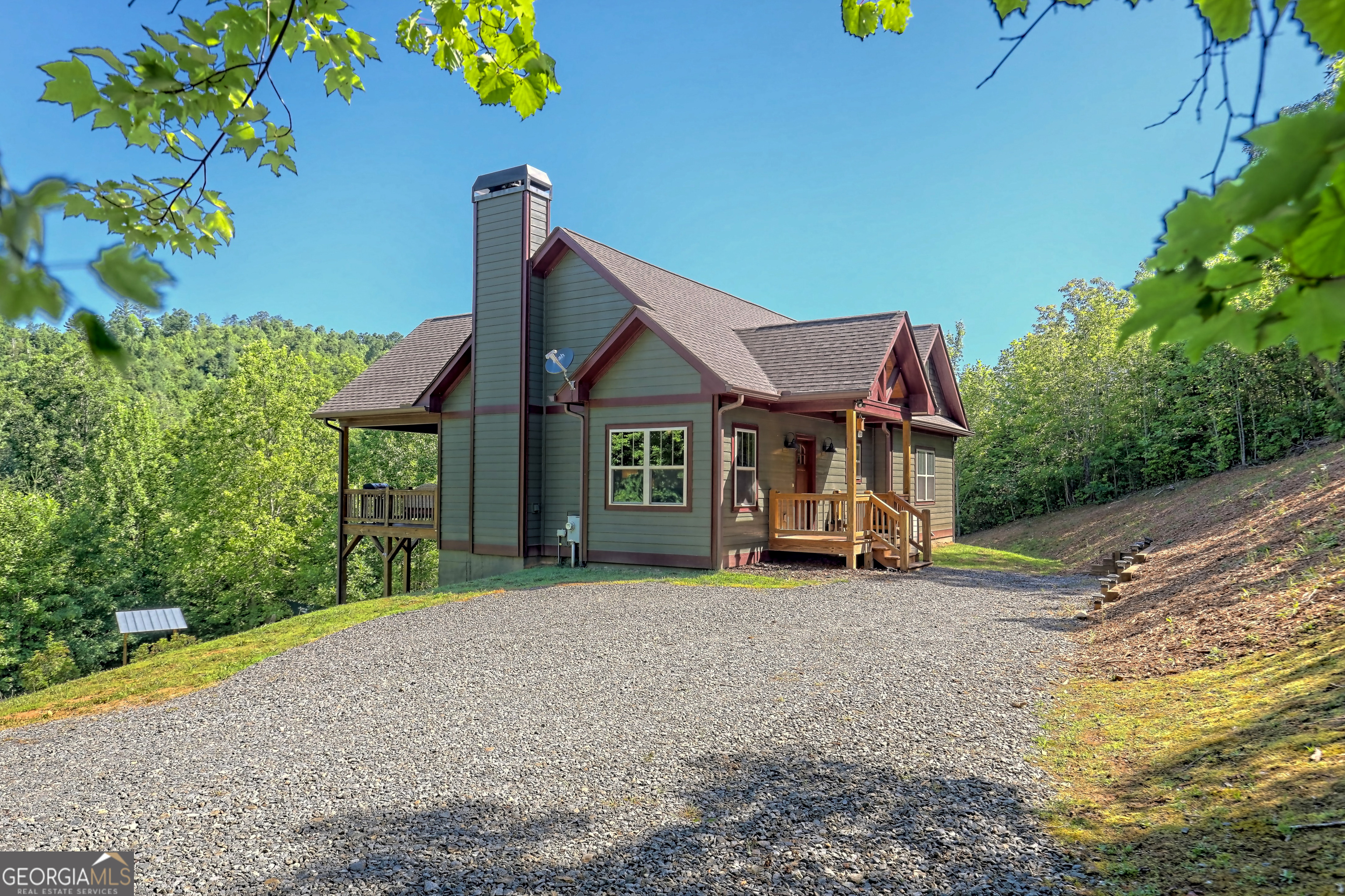 4979 Highway 197 Clarkesville, GA 30523 - Photo 1 of 62 a view of a house with a patio
