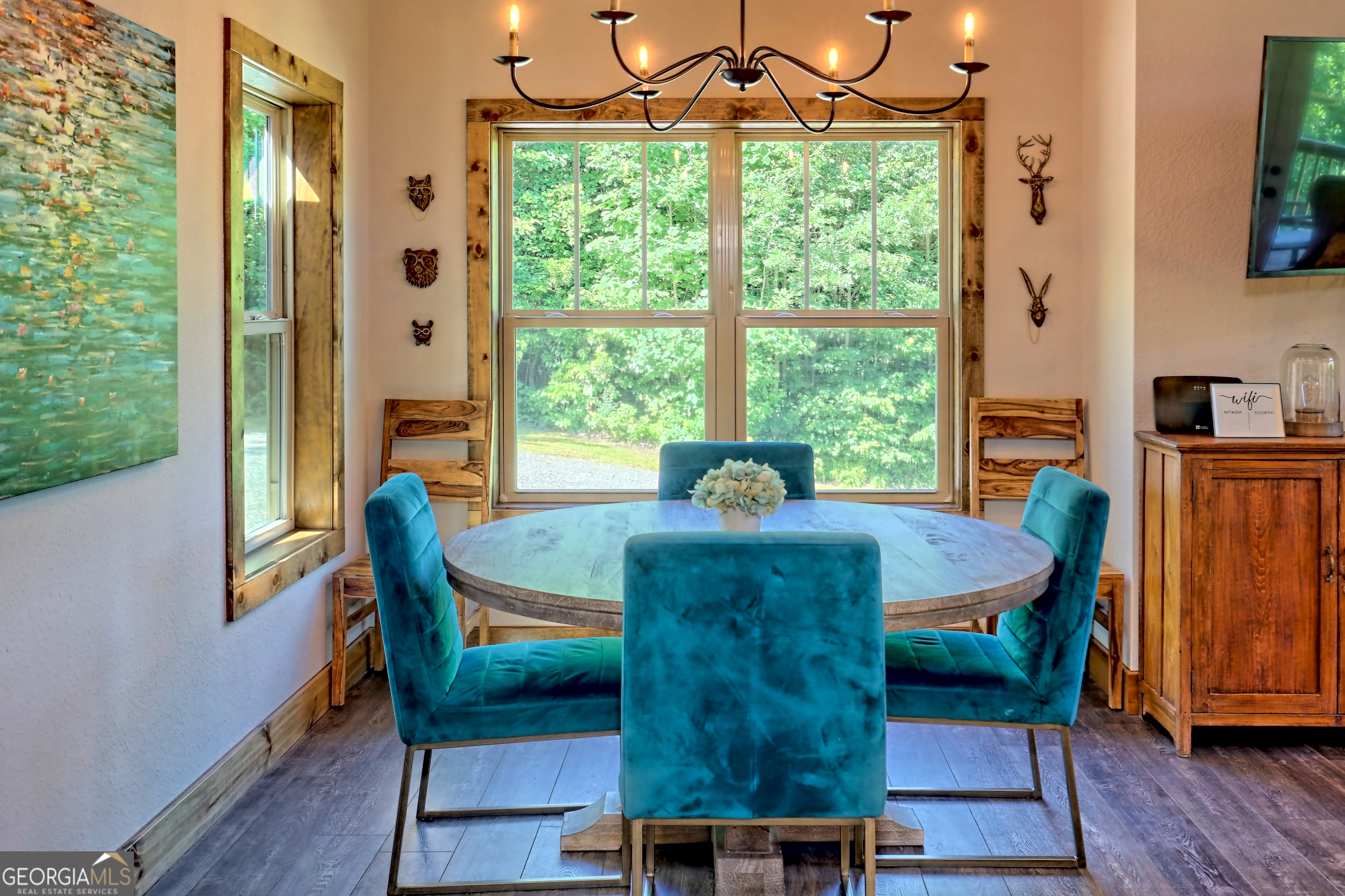 4979 Highway 197 Clarkesville, GA 30523 - Photo 13 of 62 a view of a dining room with furniture window and wooden floor