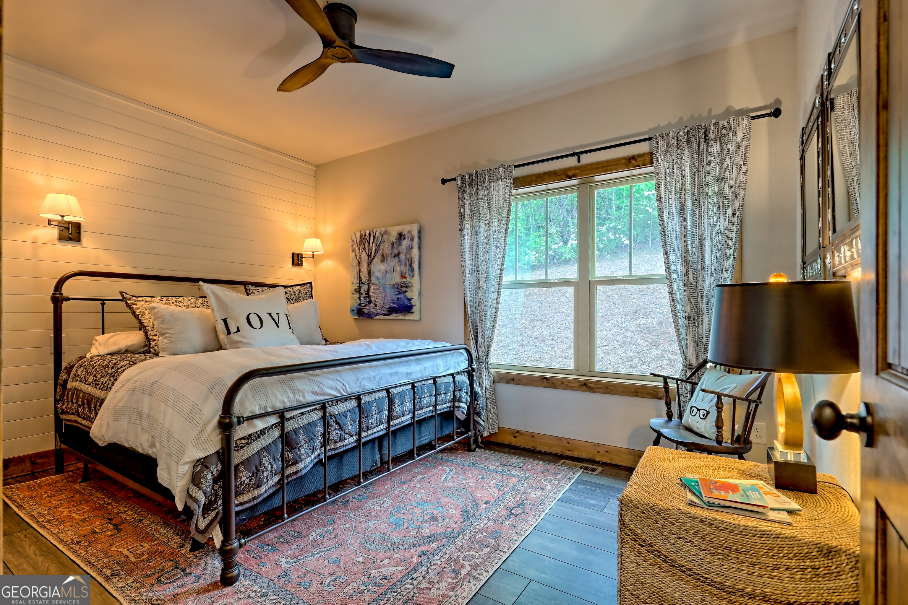 4979 Highway 197 Clarkesville, GA 30523 - Photo 21 of 62 a bedroom with a bed and a flat tv screen
