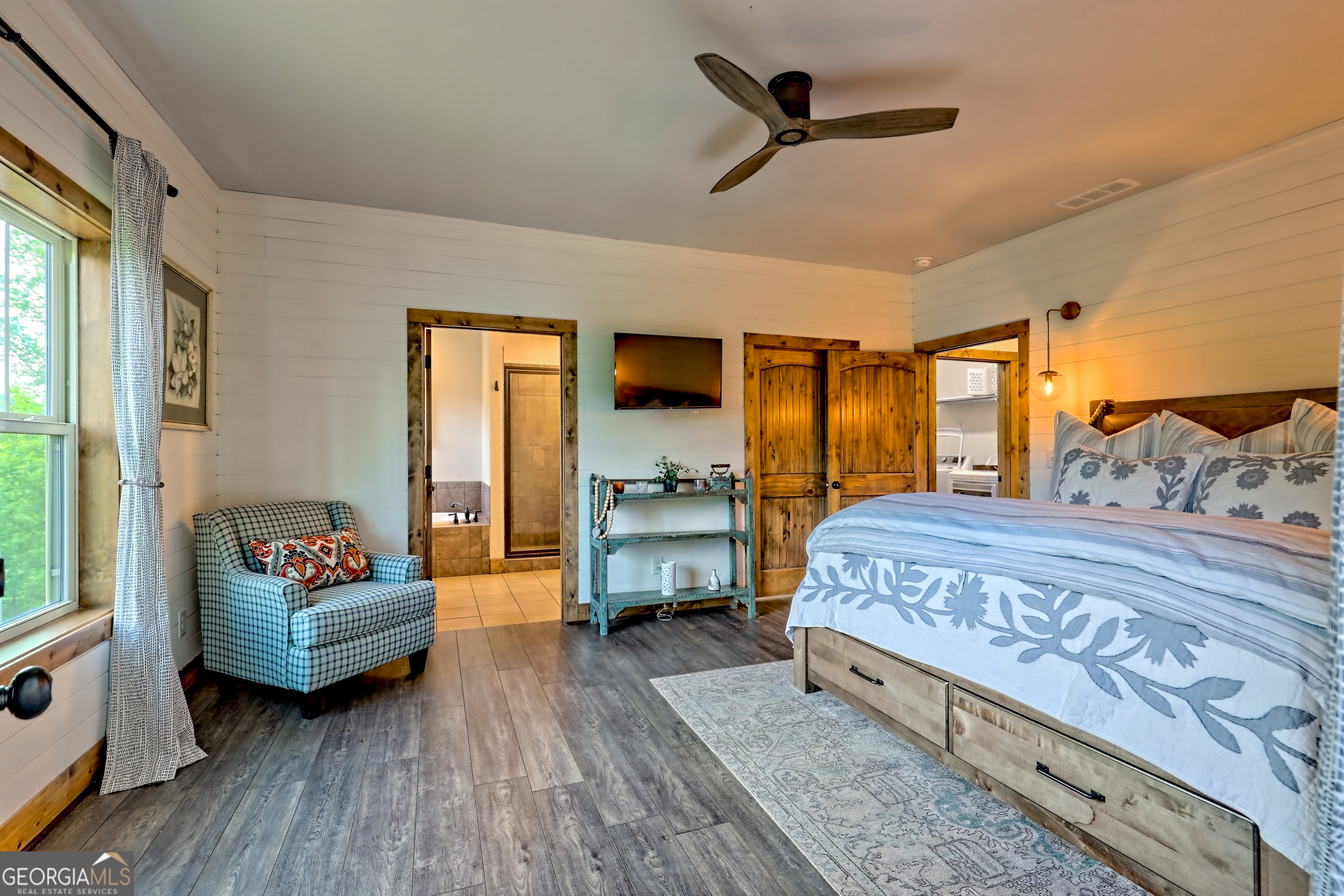 4979 Highway 197 Clarkesville, GA 30523 - Photo 25 of 62 a bedroom with a bed and wooden floor