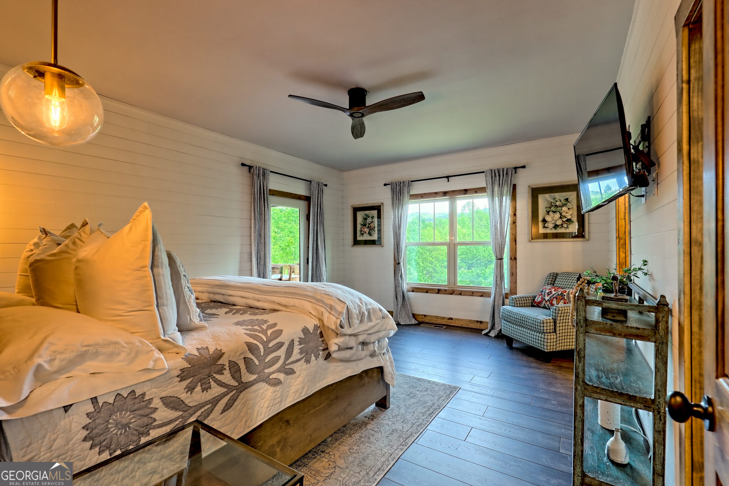 4979 Highway 197 Clarkesville, GA 30523 - Photo 26 of 62 a bedroom with a bed and wooden floor
