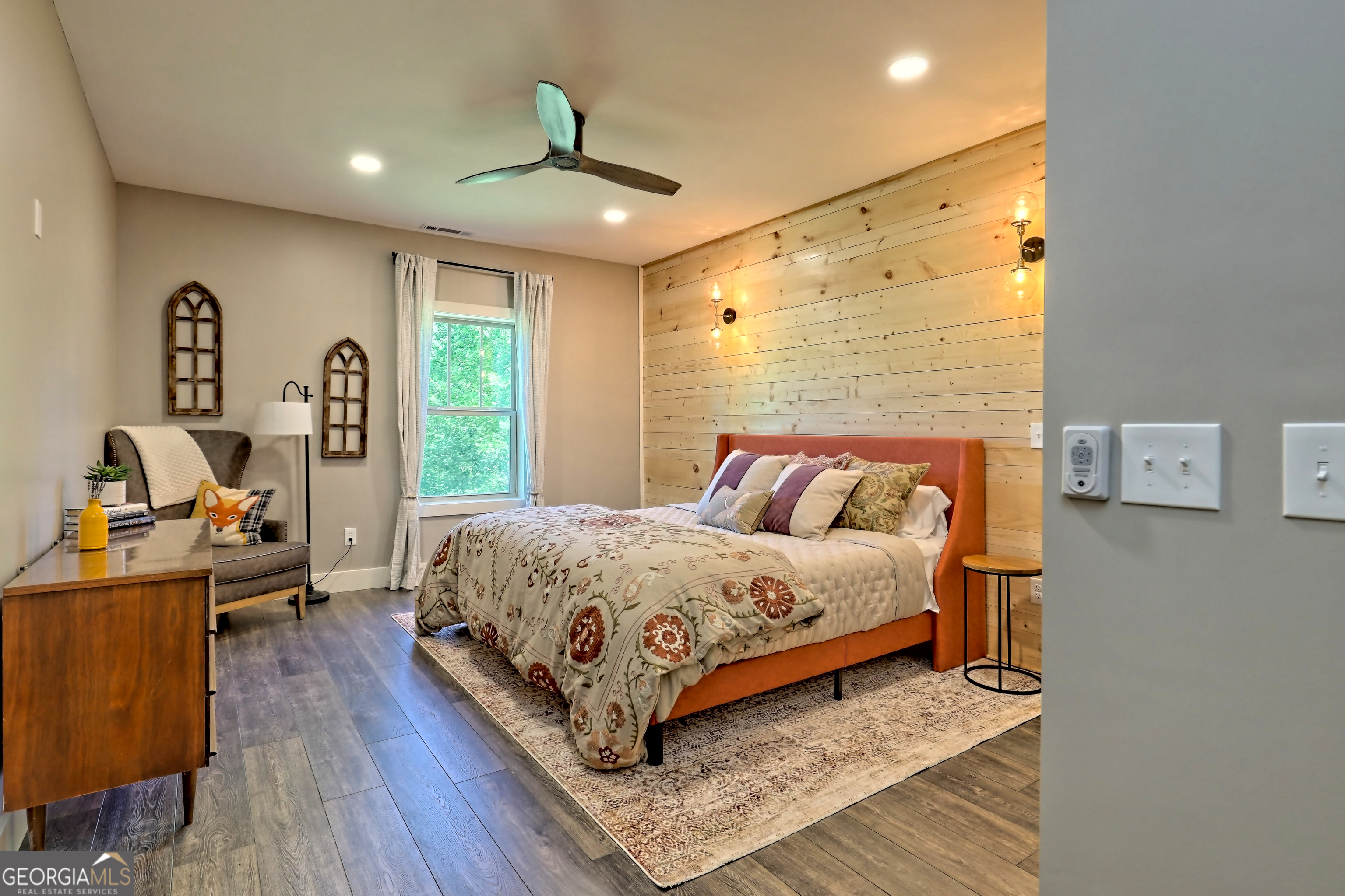 4979 Highway 197 Clarkesville, GA 30523 - Photo 37 of 62 a bedroom with a bed and wooden floor