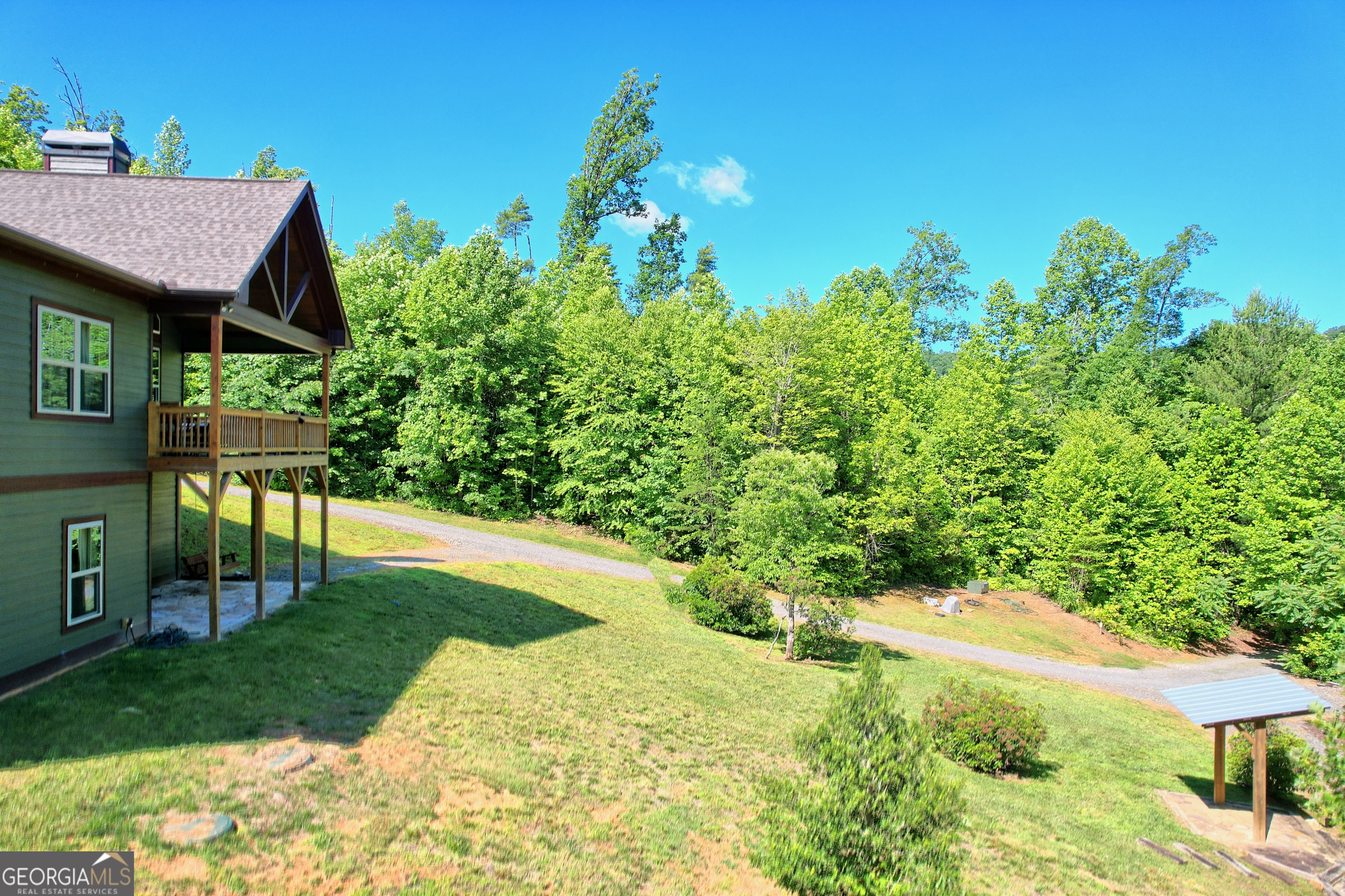 4979 Highway 197 Clarkesville, GA 30523 - Photo 49 of 62 a view of backyard with swimming pool and patio