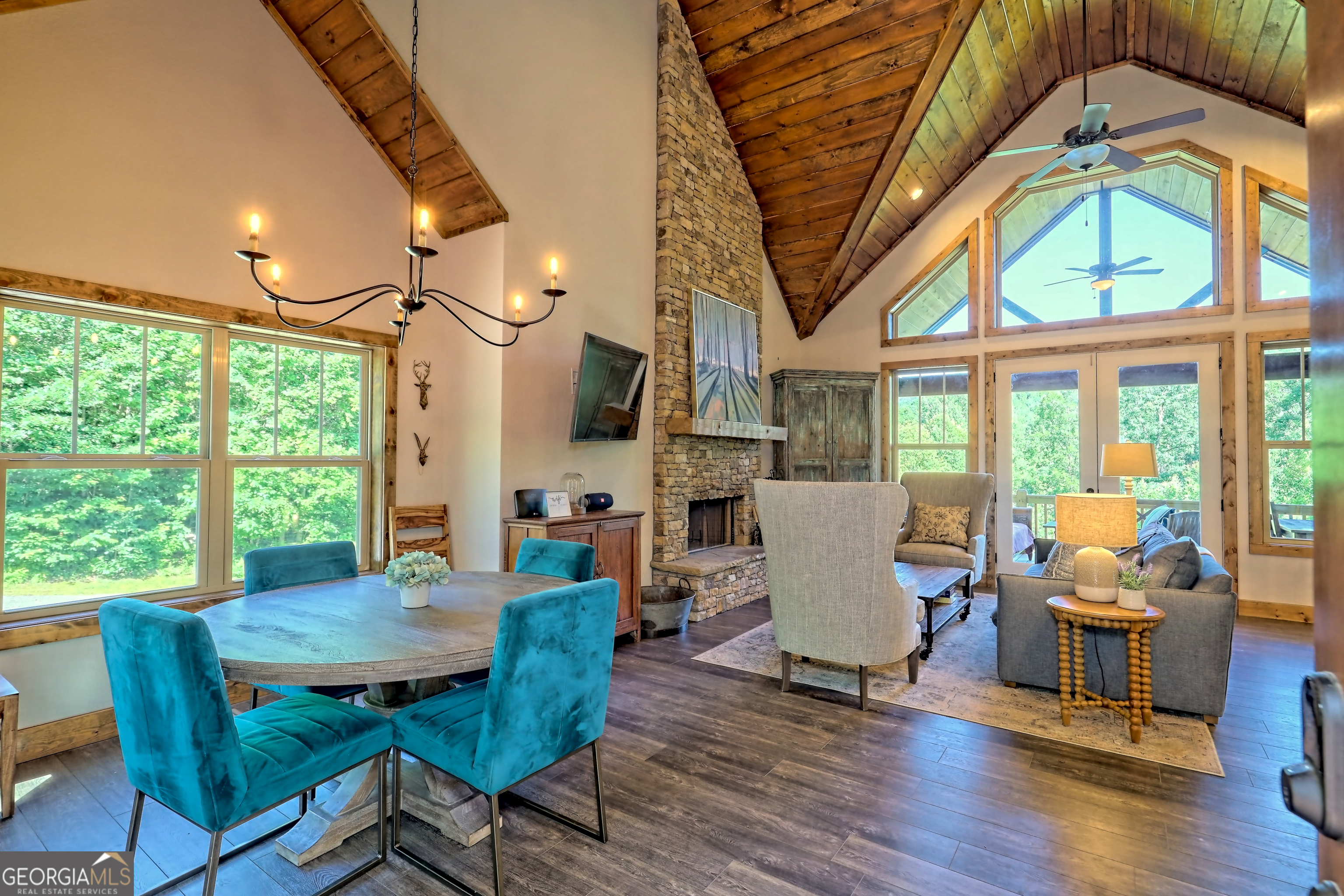 4979 Highway 197 Clarkesville, GA 30523 - Photo 5 of 62 a view of a dining room with furniture window and wooden floor
