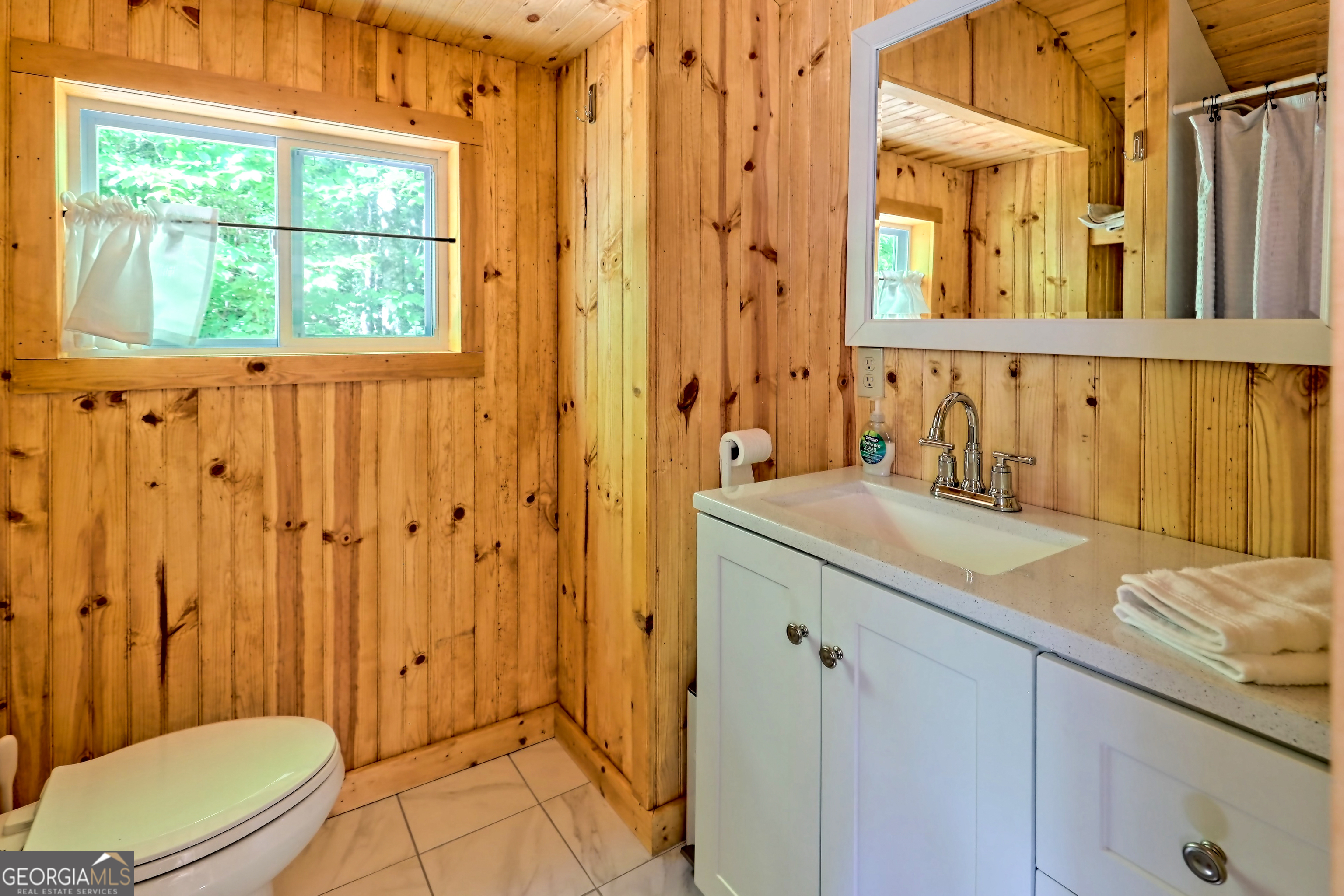4979 Highway 197 Clarkesville, GA 30523 - Photo 61 of 62 a bathroom with a sink a toilet and shower