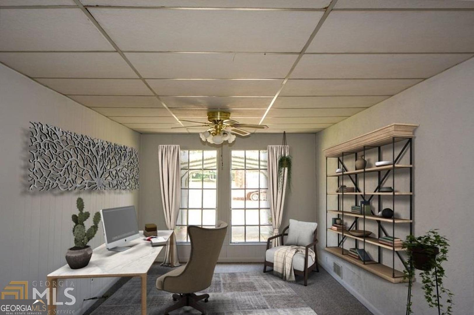 110 Flint River Road Jonesboro, GA 30238 - Photo 10 of 18 a workspace with furniture window and outside view