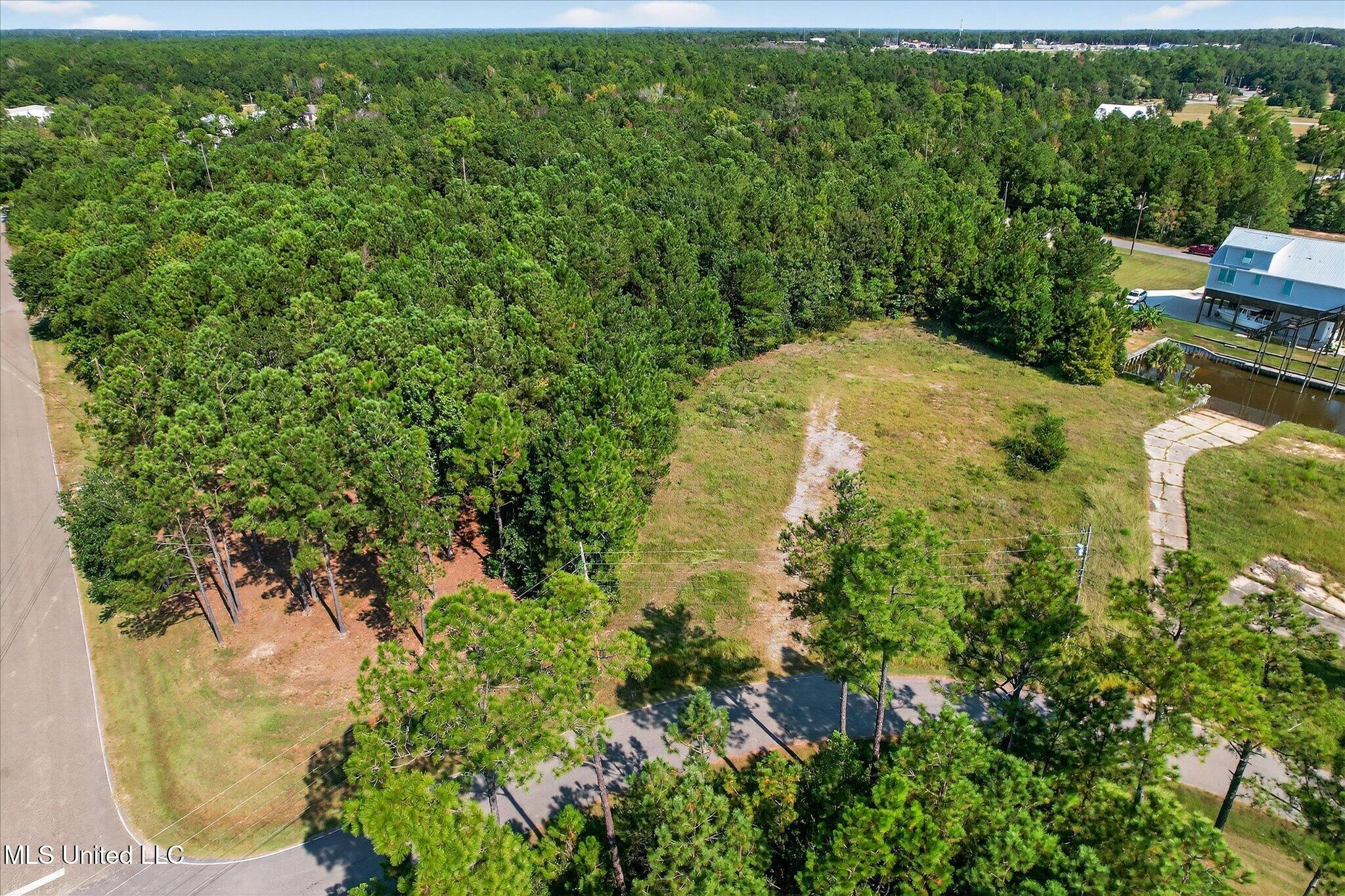 2466 Kanoa Way Diamondhead, MS 39525 - Photo 2 of 11 03-002_DJI_0012