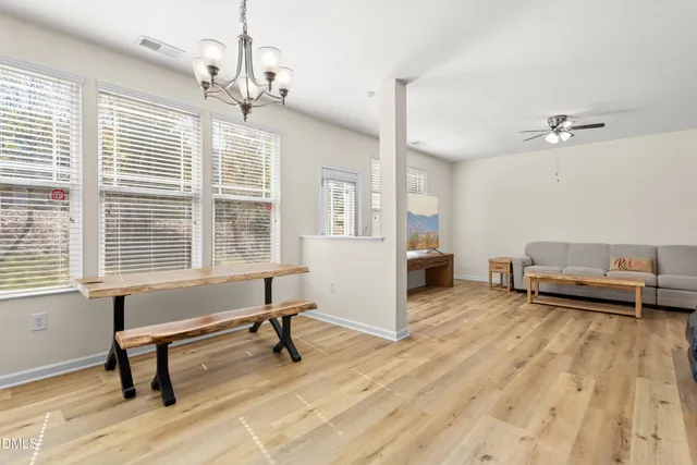 a view of kitchen and wooden floor