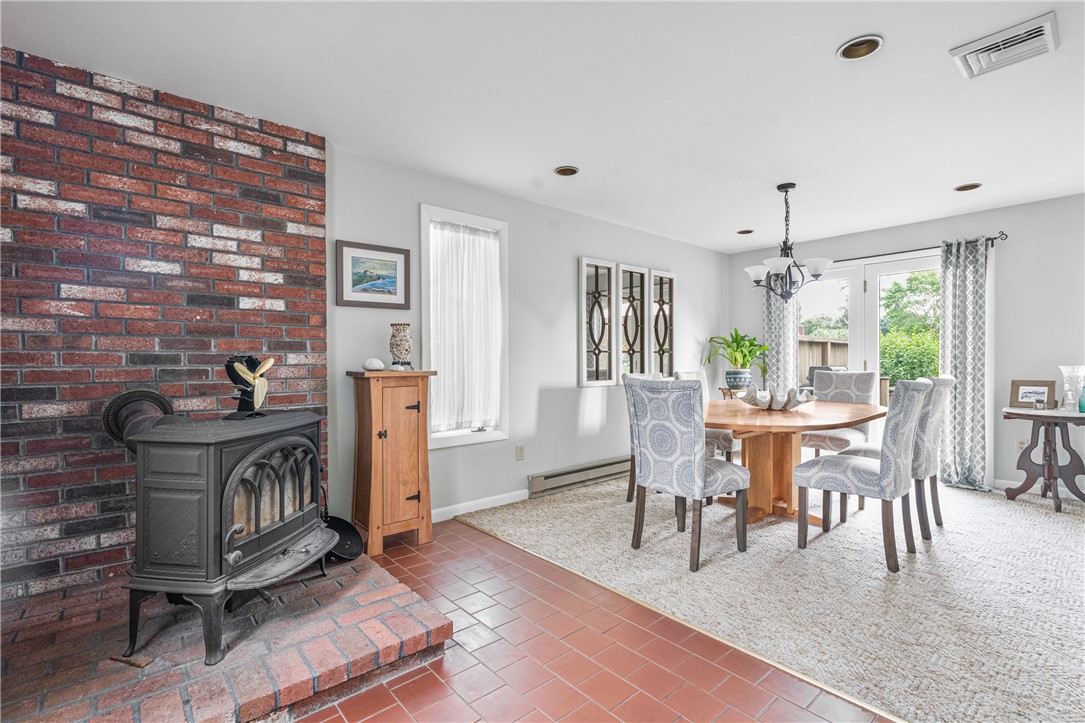 300 Kingstown Road Narragansett, RI 02882 - Photo 15 of 29 Dining Room with wood stove.