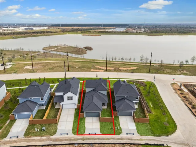 a view of swimming pool with outdoor seating