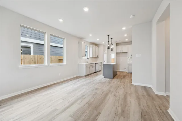 a view of kitchen with wooden floor