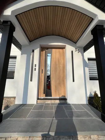 a view of a small white house