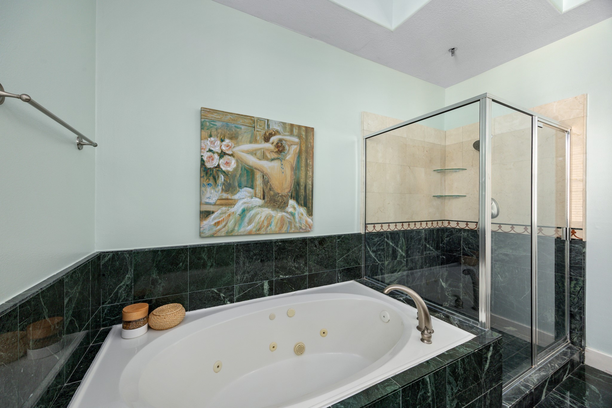 2611 Commonwealth Street Houston, TX 77006 - Photo 25 of 31 Glass-enclosed walk-in shower and a separate soaking tub create a perfect balance of luxury and functionality.