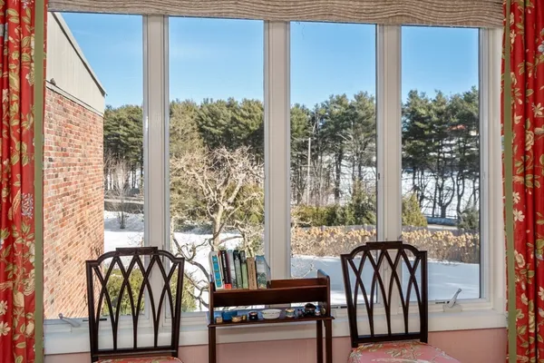 a view of balcony with patio